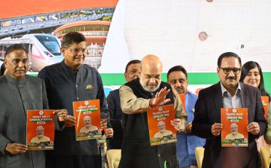 NEW DELHI INDIA JANUARY 25 2025 Union Home Minister Amit Shah along with Delhi BJP President Virendra Sachdeva BJP MP Ramvir Singh Bidhuri and party leaders releases third part of BJP manifesto for the upcoming Delhi Assembly elections on January 25  clipart