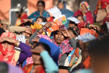 NEW DELHI INDIA JANUARY 25 2025 BJP supporters seen as BJP MP Ravi Kishan arrives to address an election rally ahead of Delhi Vidhan Sabha Elections at Kusumpur Pahadi on January 25 2025 in New Delhi India Photo by Sanchit Khanna Hindustan Times  clipart