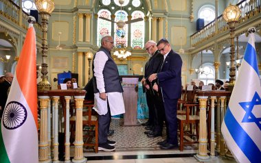 MUMBAI INDIA JANUARY 27 2025 The Consul General of Israel Kobbi Shoshani along with Maharashtra Governor C P Radhakrishnan along with dignitaries pays respects to the victims of the holocaust on International Holocaust Remembrance Day of commemorativ clipart