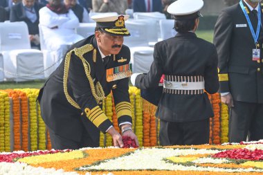 NEW DELHI INDIA JANUARY 30 2025 Chief of the Naval Staff Admiral Dinesh K Tripathi pays homage to Mahatma Gandhi on his death anniversary also observed as Martyrs Day at Rajghat on January 30 2025 in New Delhi India Photo by Ajay Aggarwal Hindustan T clipart