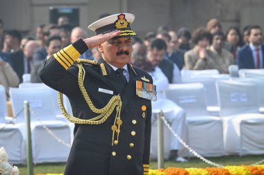 NEW DELHI INDIA JANUARY 30 2025 Chief of the Naval Staff Admiral Dinesh K Tripathi pays homage to Mahatma Gandhi on his death anniversary also observed as Martyrs Day at Rajghat on January 30 2025 in New Delhi India Photo by Ajay Aggarwal Hindustan T clipart