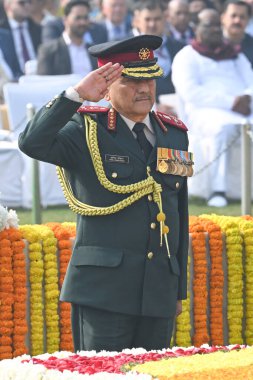 NEW DELHI INDIA JANUARY 30 2025 Chief of Defence Staff CDS General Anil Chauhan pays homage to Mahatma Gandhi on his death anniversary also observed as Martyrs Day at Rajghat on January 30 2025 in New Delhi India Photo by Ajay Aggarwal Hindustan Time clipart