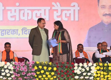 NEW DELHI INDIA JANUARY 31 Ocak 2025 Delhi BJP başkanı Virendra Sachdeva ve Batı Delhi milletvekili Kamaljeet Sehrawat vikasit Delhi Sankalp mitinginde 31 Ocak 2025 tarihinde Yeni Delhi Hindistan 'da yapılacak Delhi montaj mitinginde