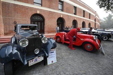 NEW DELHI INDIA FEBRUARY 2 2025 Vintage Car showcased by District Election Office to promote Vintage Drive for Voter Awareness ahead of Delhi assembly election at Major Dhyan Chand stadium on February 2 2025 in New Delhi India The rally was flagged o clipart