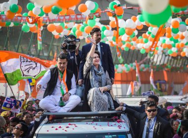 NEW DELHI INDIA FEBRUARY 3 2025 Congress General Secretary Priyanka Gandhi during a Roadshow at Kotla MubarakPur Kasturba Nagar Constituency rallying support for Congress candidate Abhishek Dutt ahead of the 2025 Delhi Assembly elections elections on clipart