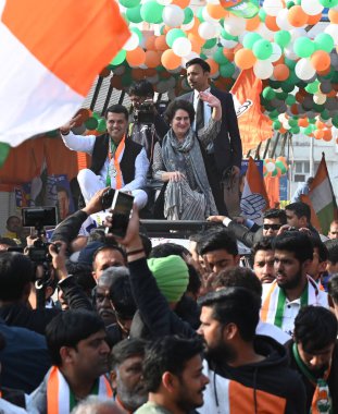 NEW DELHI INDIA FEBRUARY 3 2025 Congress General Secretary Priyanka Gandhi during a Roadshow at Kotla MubarakPur Kasturba Nagar Constituency rallying support for Congress candidate Abhishek Dutt ahead of the 2025 Delhi Assembly elections elections on clipart