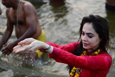 PRAYAGRAJ INDIA FEBRUARY 3 2025 Female Sanyasini taking a holy dip during the third ' Amrit bath' on the occasion of Basant Panchami at Triveni Sangam on February 3 2025 in Prayagraj India Photo by Deepak Gupta Hindustan Times clipart