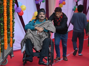 NEW DELHI INDIA FEBRUARY 5 2025 Mukesh Gupta patient during the cast his vote for Delhi Assembly Election at the polling booth in St Xavier s School Raj Niwas Marg on February 5 2025 in New Delhi India A voter turnout of 57 per cent was recorded till clipart