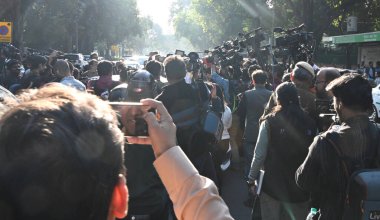 NEW DELHI, INDIA - FEBRUARY 7: Members of the Anti Corruption Bureau (ACB) arrive at the residence of AAP national convener Arvind Kejriwal after Delhi Lt Governor VK Saxena ordered a probe into allegations by the party leaders  clipart