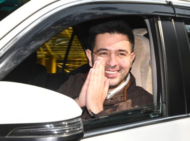 NEW DELHI INDIA FEBRUARY 11 2025 AAP Leader and Rajya Sabha MP Raghav chadha arrive for meeting with Punjab Chief Minister Bhagwant Mann with Cabinet Ministers and AAP MLAs after a meeting with the party national convenor Arvind Kejriwal at the Kapur clipart