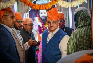 NEW DELHI INDIA FEBRUARY 12 2025 JP Nadda National President of BJP along with Member of Parliament Basuri Swaraj and other senior leaders offer prayers at Guru Ravidas Vishramdham Karol Bagh on the occasion of Guru Ravidas Jayanti on February 12 202 clipart