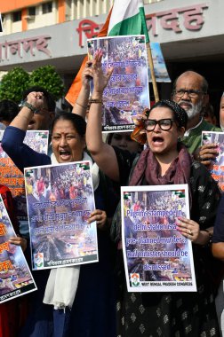 KOLKATA, INDIA - FEBRUARY 17, 2025: Members of Congress party stage protest over New Delhi Railway Station stampede issues and demands resignation of Railway Minister Ashwini Vaishnaw in front of Sealdah Station. clipart