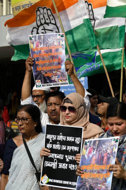 KOLKATA, INDIA - FEBRUARY 17, 2025: Members of Congress party stage protest over New Delhi Railway Station stampede issues and demands resignation of Railway Minister Ashwini Vaishnaw in front of Sealdah Station. clipart