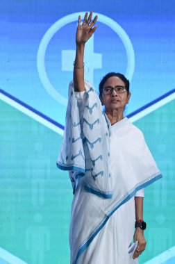 KOLKATA INDIA FEBRUARY 24 2025 West Bengal Chief Minister Mamata Banerjee during the programme Chikitsar Arek Naam Seva organised by State Level Grievance Redressal Committee of Health and Family Welfare Dept where more 2000 senior and junior doctors clipart