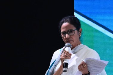 KOLKATA INDIA FEBRUARY 24 2025 West Bengal Chief Minister Mamata Banerjee addresses to doctors during the programme Chikitsar Arek Naam Seva organised by State Level Grievance Redressal Committee of Health and Family Welfare Dept  clipart