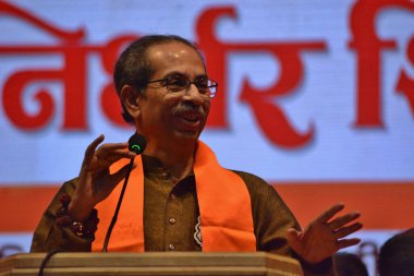 Shiv Sena UBT President Uddhav Thackray, MP Sanjay Raut and party leaders at the Shiv Sena UBT workers' rally at Kalidas Hall in Mulund in the backdrop of the upcoming municipal elections, on March 9, 2025 in Mumbai, India.  clipart