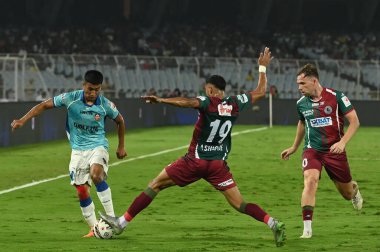Mohun Bagan SG 'den GK Dheeraj (12), 8 Mart 2025 tarihinde Hindistan' ın Kolkata kentinde oynanan Hindistan Süper Ligi (ISL) maçında FC Goa 'ya karşı bir topu engelledi.. 