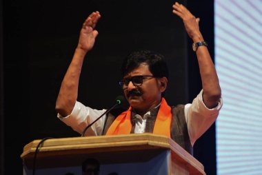 Shiv Sena UBT MP Sanjay Raut addresses workers at the Shiv Sena UBT workers' rally at Kalidas Hall in Mulund in the backdrop of the upcoming municipal elections, on March 9, 2025 in Mumbai, India.  clipart