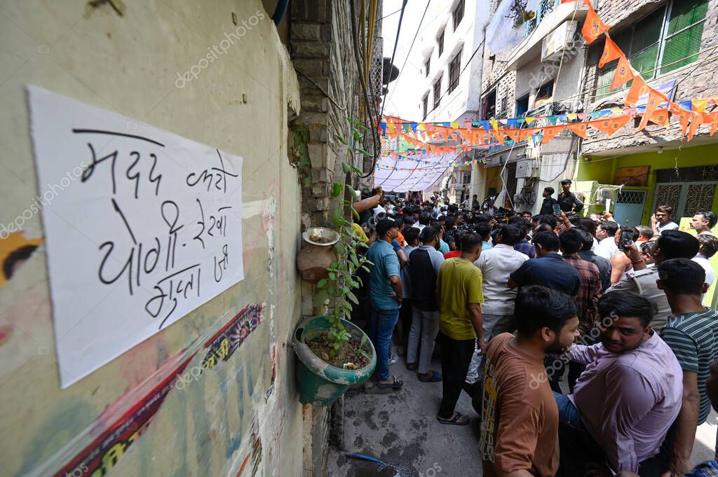 NEW DELHI INDIA APRIL 18 2025 Crowd gathered outside the house of 17 year old boy who was stabbed to death in Seelampur area on April 18 2025 in New Delhi India A 17 year old boy was brutally stabbed to death in J Block of New Seelampur in North East