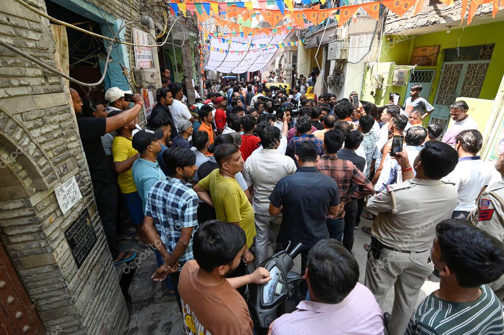 NEW DELHI INDIA APRIL 18 2025 Crowd gathered outside the house of 17 year old boy who was stabbed to death in Seelampur area on April 18 2025 in New Delhi India A 17 year old boy was brutally stabbed to death in J Block of New Seelampur in North East