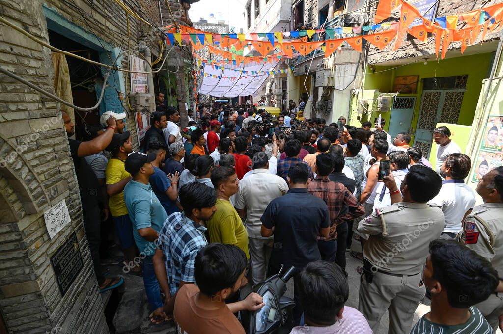NEW DELHI INDIA APRIL 18 2025 Crowd gathered outside the house of 17 year old boy who was stabbed to death in Seelampur area on April 18 2025 in New Delhi India A 17 year old boy was brutally stabbed to death in J Block of New Seelampur in North East