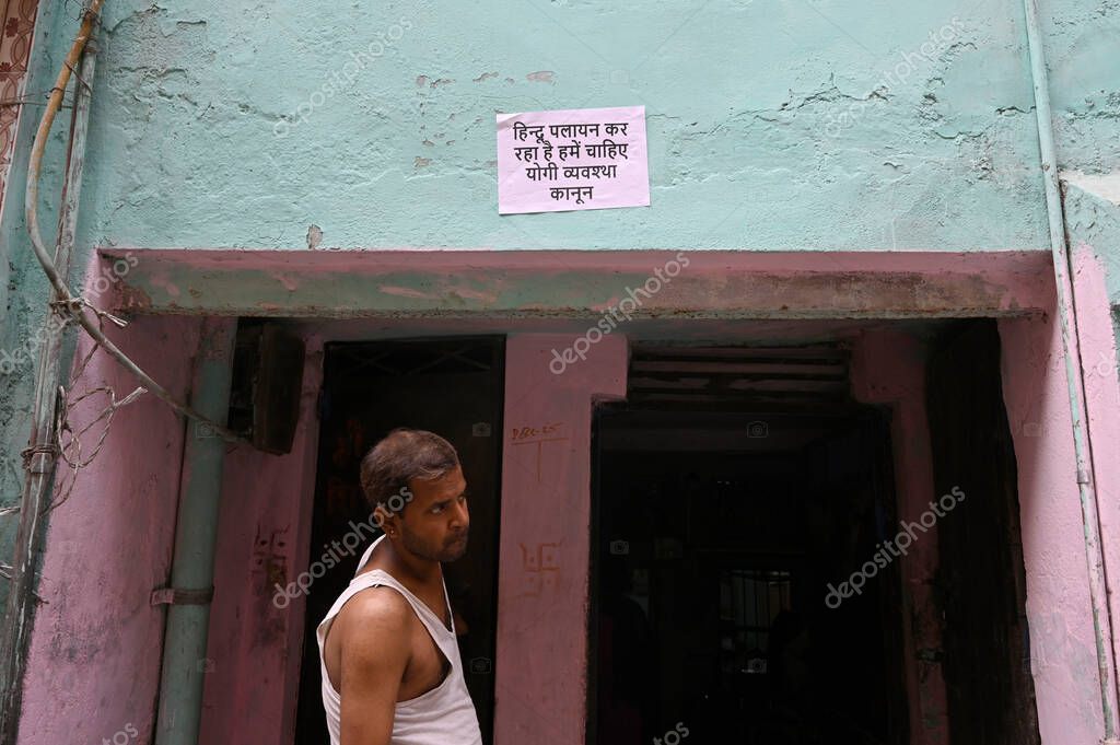 NEW DELHI INDIA APRIL 20 2025 A poster that reads Hindus are migrating Modi ji please help put up in Delhi s Seelampur area on April 20 2025 in New Delhi India According to police officials information about the stabbing incident was received at PS S