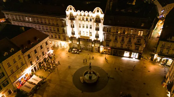 stock image Aerial Drone Night Photo of Bratislava, Slovakia's Historic Main Square.