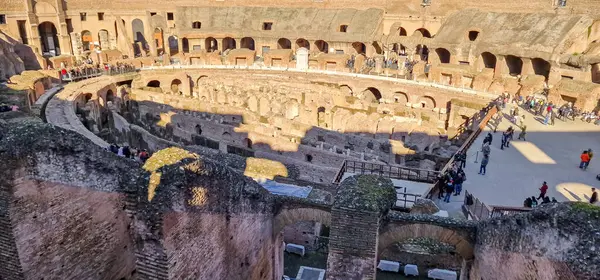 stock image Interior View of the Roman Colosseum-The Colosseum is one of the most iconic and historically significant landmarks in Rome, Italy. It stands as a testament to the engineering prowess and cultural grandeur of the Roman Empire.