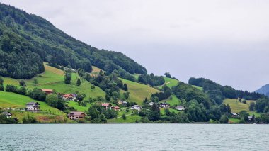 Mondsee Lake, located in the Upper Austrian region near Salzburg, is a stunning glacial lake renowned for its clear waters, picturesque surroundings, and a wide array of recreational activities. clipart