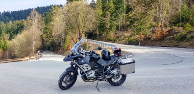 BMW Motorcycle Parked in the Hills of Smolnik, Slovakia. clipart