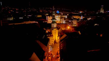 Aerial drone night photo of Bratislava Old Town, Slovakia's cityscape and St. Michael's gate clipart