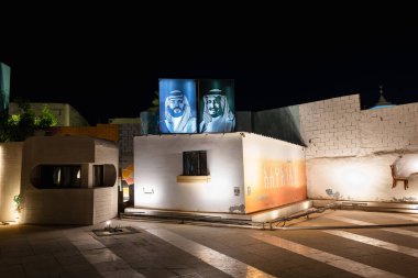 Portraits of the Saudi Royal Family on a Building Near the Qaisariya Al-Ahsa Souq Area. 