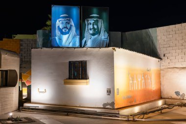 Portraits of the Saudi Royal Family on a Building Near the Qaisariya Al-Ahsa Souq Area. 