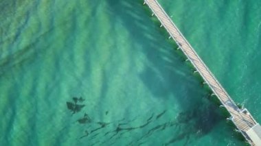 Güney Avustralya üzerinde Jetty Sunset - Christies Beach Christies Beach Güney Adelaide metropolitan bölgesinde, Onkaparinga şehrinin içinde bir deniz kenarı banliyösüdür..