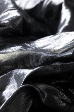 Fütürist kumaş, metal ve gümüş yansımalar, dalgalı soyut kumaş parçası.