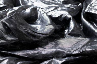 Fütürist kumaş, metal ve gümüş yansımalar, dalgalı soyut kumaş parçası.
