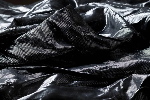 Fütürist kumaş, metal ve gümüş yansımalar, dalgalı soyut kumaş parçası.