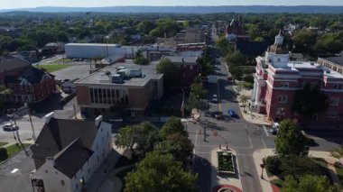 Discover the charming streets and historic buildings of Martinsburg, West Virginia on a sunny autumn day with stunning aerial views of the cityscape.