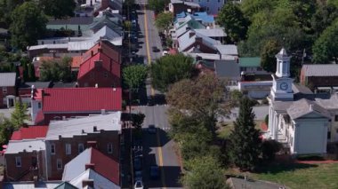 Explore the beauty of Shepherdstown, West Virginia, with vibrant autumn colors and scenic architecture, showcasing its historic charm and natural landscape.