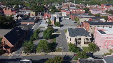 Discover Martinsburgs beautiful architecture and quaint streets under a clear autumn sky, showcasing historic buildings and vibrant community life.