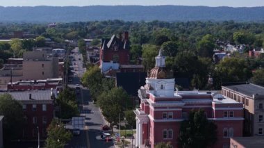 Explore the beauty of Martinsburg, West Virginia. Enjoy aerial views showing the colorful autumn scenery, historic buildings, and charming streets.