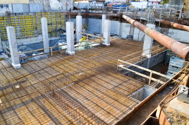 Construction site of a residential building in Poland featuring an underground garage. This image showcases the process of modern housing development, highlighting the integration of convenient clipart