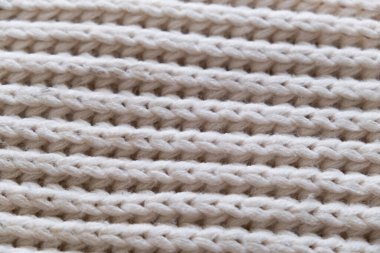 Örgü beyaz kumaş dokusu arkaplanı.
