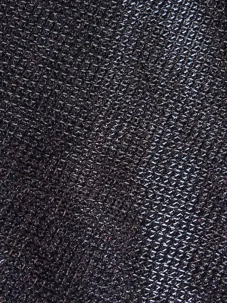 Stock image Black fabric close-up. The texture of the black mesh fabric. Mesh fabric. Background, texture, place for text, background for text.