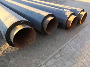 Pipes for pipeline repair. Repair of water supply, heating main. Construction work on replacement of water pipes. Industry. Background, place for text. clipart