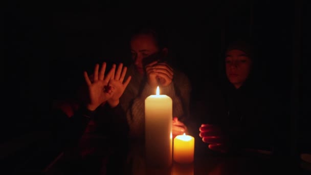 Family Sitting Candles Blackout War Ukraine — Video