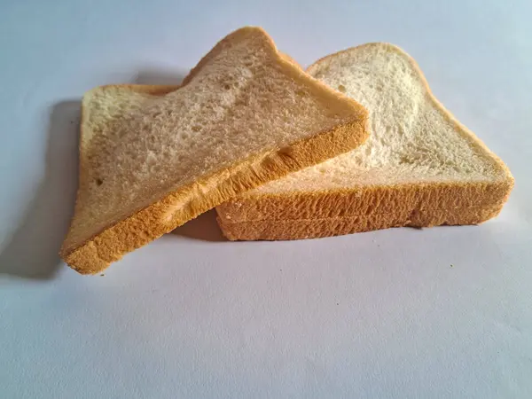 Beyaz ekmek, beyaz bir arka plan üzerinde izole