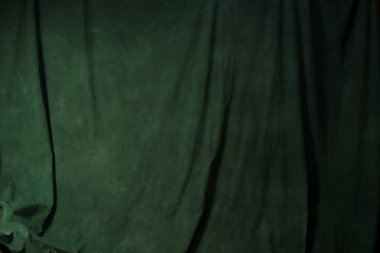 Koyu yeşil soyut kumaş arka plan. Boş soyut yeşil fon. Fotoğraf stüdyosu geçmişi