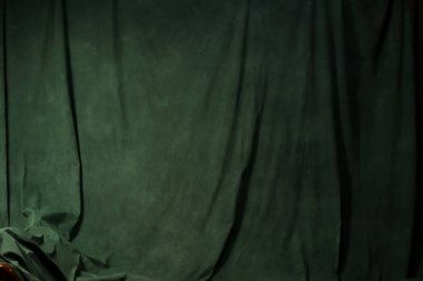 Koyu yeşil soyut kumaş arka plan. Boş soyut yeşil fon. Fotoğraf stüdyosu geçmişi