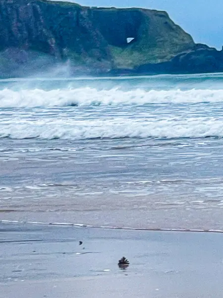 stock image Seaspray at Whitepark Bay and Portbradden Tunnel